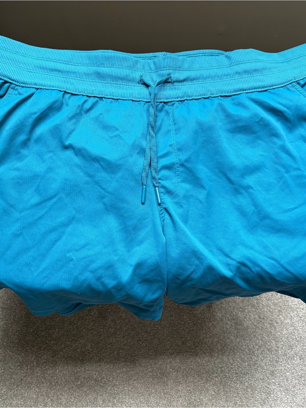 The North Face Women's Athletic Shorts in Bright Teal Blue